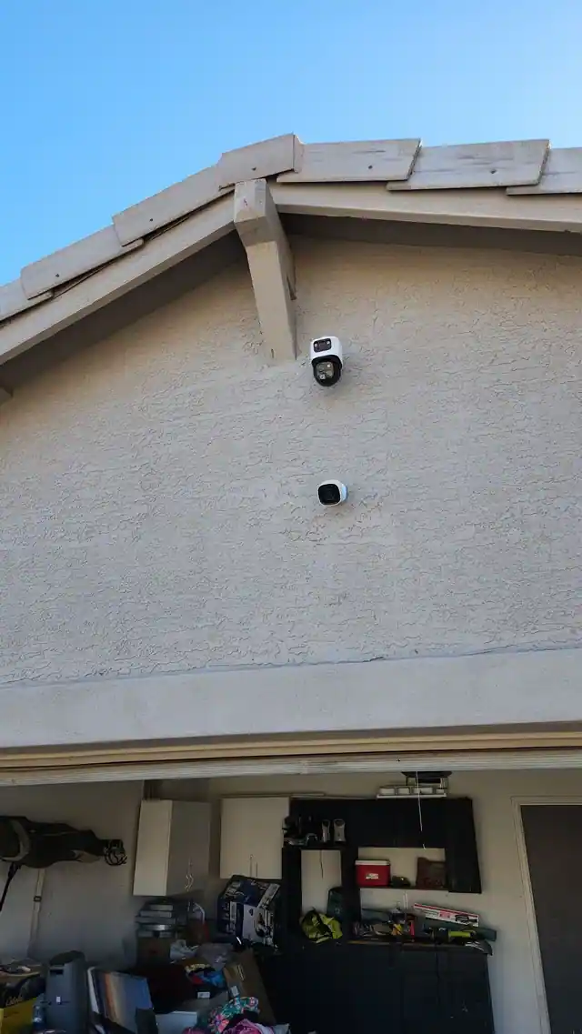 Two exterior cameras positioned for layered coverage