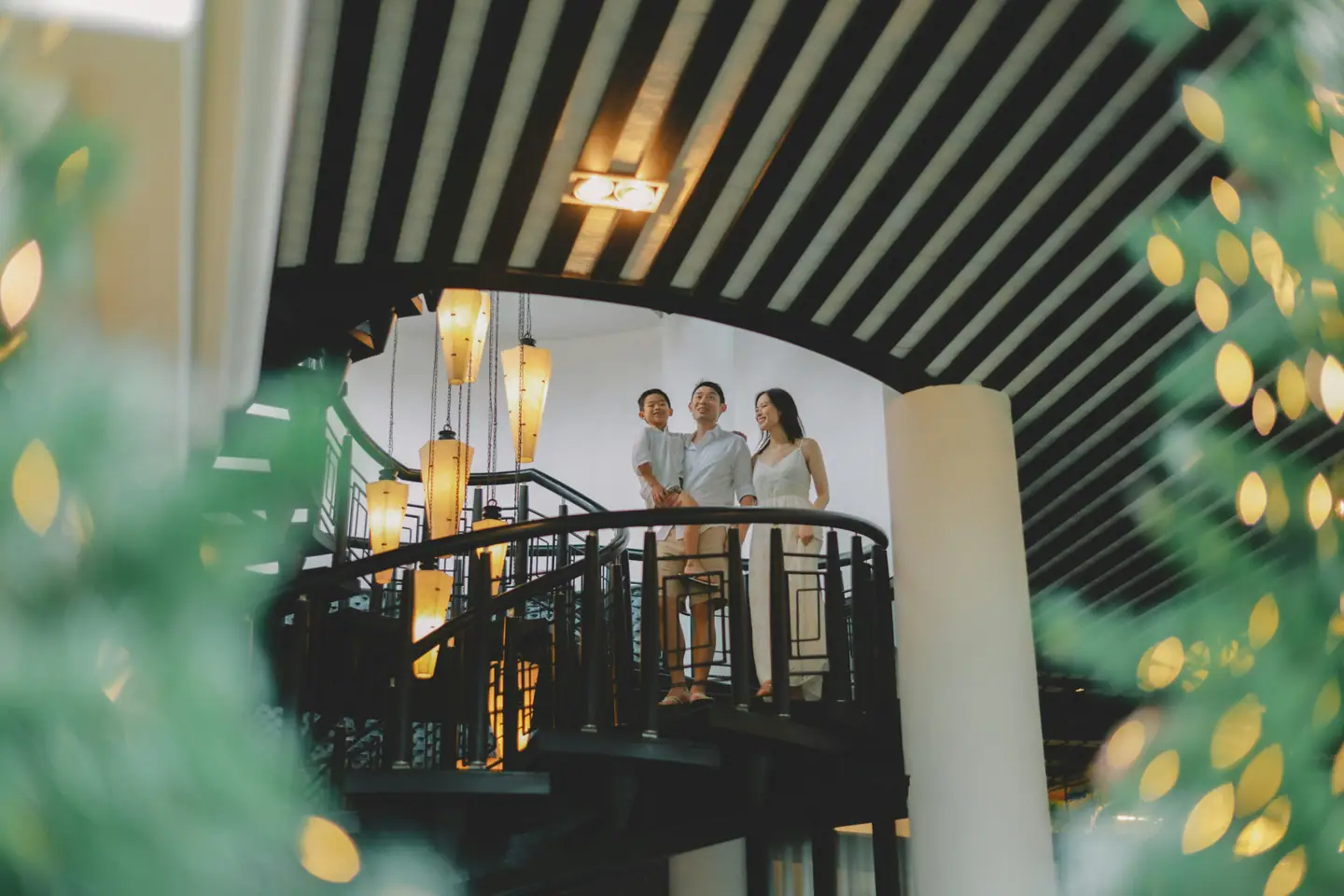Family standing together inside a home